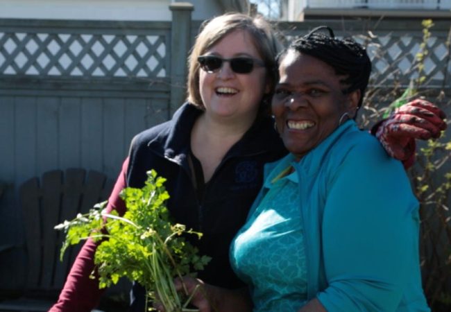 Beulah garden club holding fresh vegetables