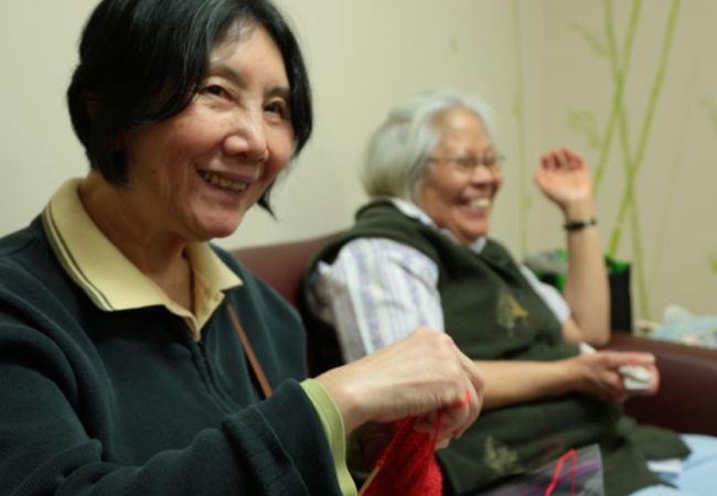 Beulah's knitting club having fun and laughing